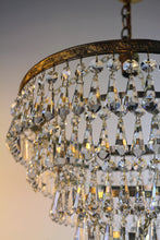 Load image into Gallery viewer, SOLD - Stunning Vintage 5 Tier Chandelier - A beautiful leaf patterned brass frame chandelier with an abundance of button & bomb vintage crystals.