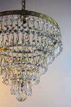 Load image into Gallery viewer, SOLD - Stunning Vintage 5 Tier Chandelier - A beautiful leaf patterned brass frame chandelier with an abundance of button & bomb vintage crystals.