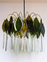 Load image into Gallery viewer, Hand-made chandelier with reclaimed champagne glass. Add a unique piece to your home Jewelstreetlighting lighting up sustainability!