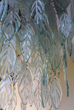 Load image into Gallery viewer, Original Bespoke botanical Chandelier. leaves cascade from 48 branches. These unique glass leaves are created from Recycled glass.