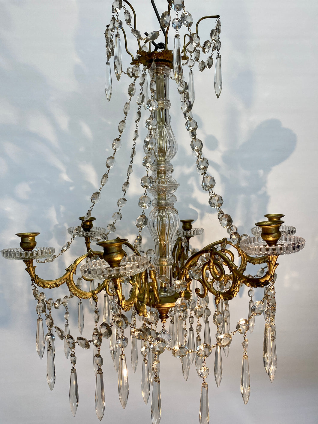 Antique / vintage Candelabra with 6 ornate Brass arms with an abundance of crystal swags & prism drops.