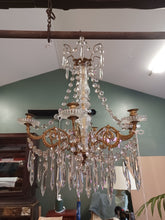 Load image into Gallery viewer, Antique / vintage Candelabra with 6 ornate Brass arms with an abundance of crystal swags &amp; prism drops.
