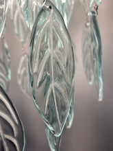 Load image into Gallery viewer, Original Bespoke botanical Chandelier. leaves cascade from 48 branches. These unique glass leaves are created from Recycled glass.
