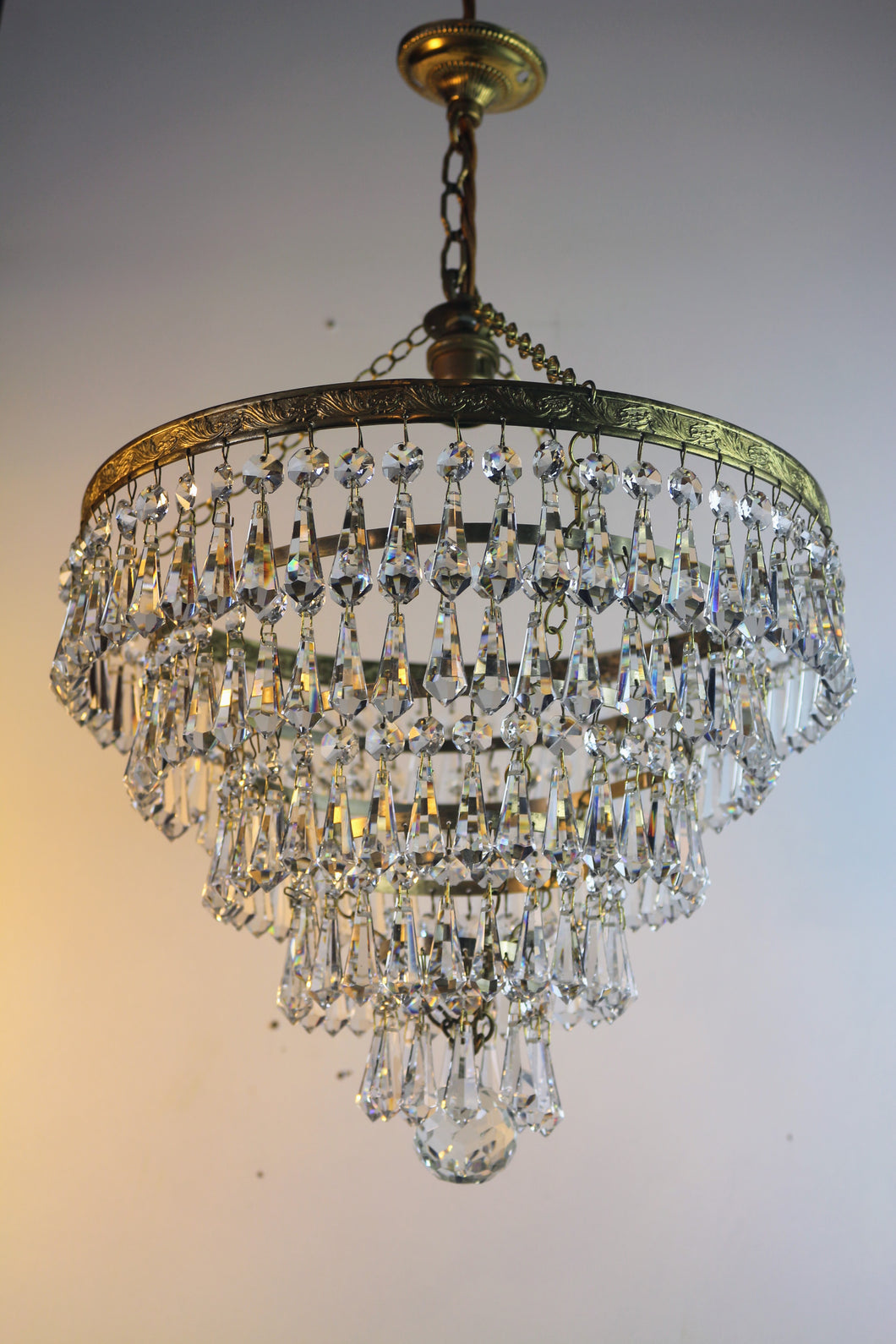 SOLD - Stunning Vintage 5 Tier Chandelier - A beautiful leaf patterned brass frame chandelier with an abundance of button &  bomb vintage crystals.