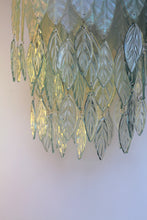 Load image into Gallery viewer, Original Bespoke botanical Chandelier. leaves cascade from 48 branches. These unique glass leaves are created from Recycled glass.
