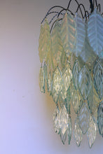 Load image into Gallery viewer, Original Bespoke botanical Chandelier. leaves cascade from 48 branches. These unique glass leaves are created from Recycled glass.
