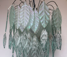 Load image into Gallery viewer, Original Bespoke botanical Chandelier. leaves cascade from 48 branches. These unique glass leaves are created from Recycled glass.
