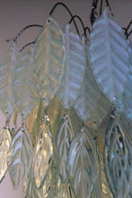 Load image into Gallery viewer, Original Bespoke botanical Chandelier. leaves cascade from 48 branches. These unique glass leaves are created from Recycled glass.
