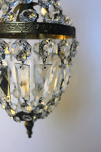 Load image into Gallery viewer, Empire Chandelier. Vintage crystal Light With Elegant Art Nouveau detailed brass frame. Complete with original ornate ceiling rose.
