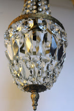Load image into Gallery viewer, Empire Chandelier. Vintage crystal Light With Elegant Art Nouveau detailed brass frame. Complete with original ornate ceiling rose.
