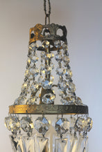 Load image into Gallery viewer, Empire Chandelier. Vintage crystal Light With Elegant Art Nouveau detailed brass frame. Complete with original ornate ceiling rose.
