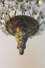 Load image into Gallery viewer, Empire Chandelier. Vintage crystal Light With Elegant Art Nouveau detailed brass frame. Complete with original ornate ceiling rose.
