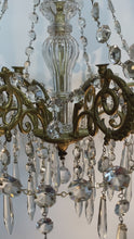 Load and play video in Gallery viewer, Antique / vintage Candelabra with 6 ornate Brass arms with an abundance of crystal swags &amp; prism drops.
