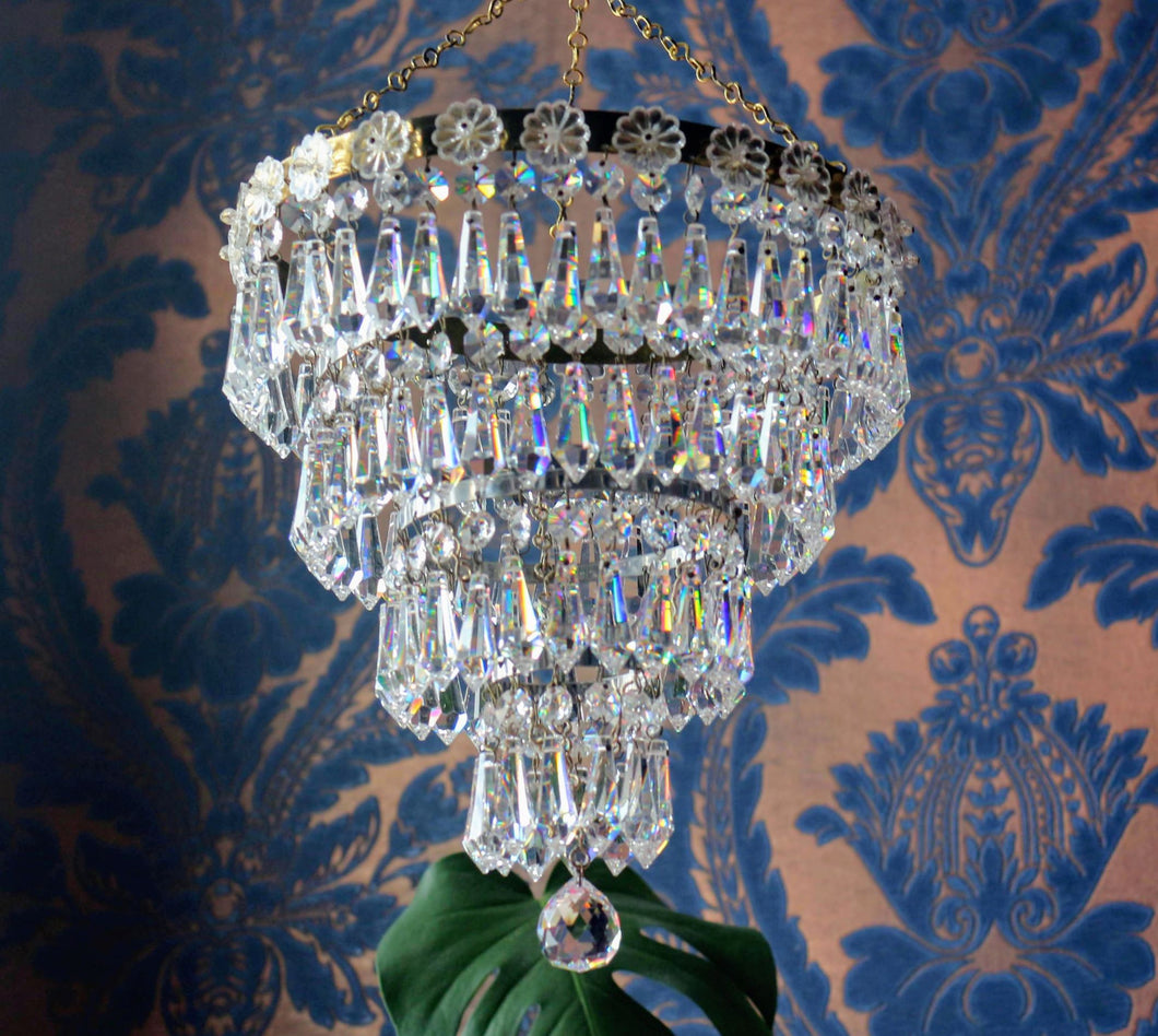 SOLD Stunning 4 Tier Crystal Prism Waterfall Chandelier with Crystal Rose Detailing.