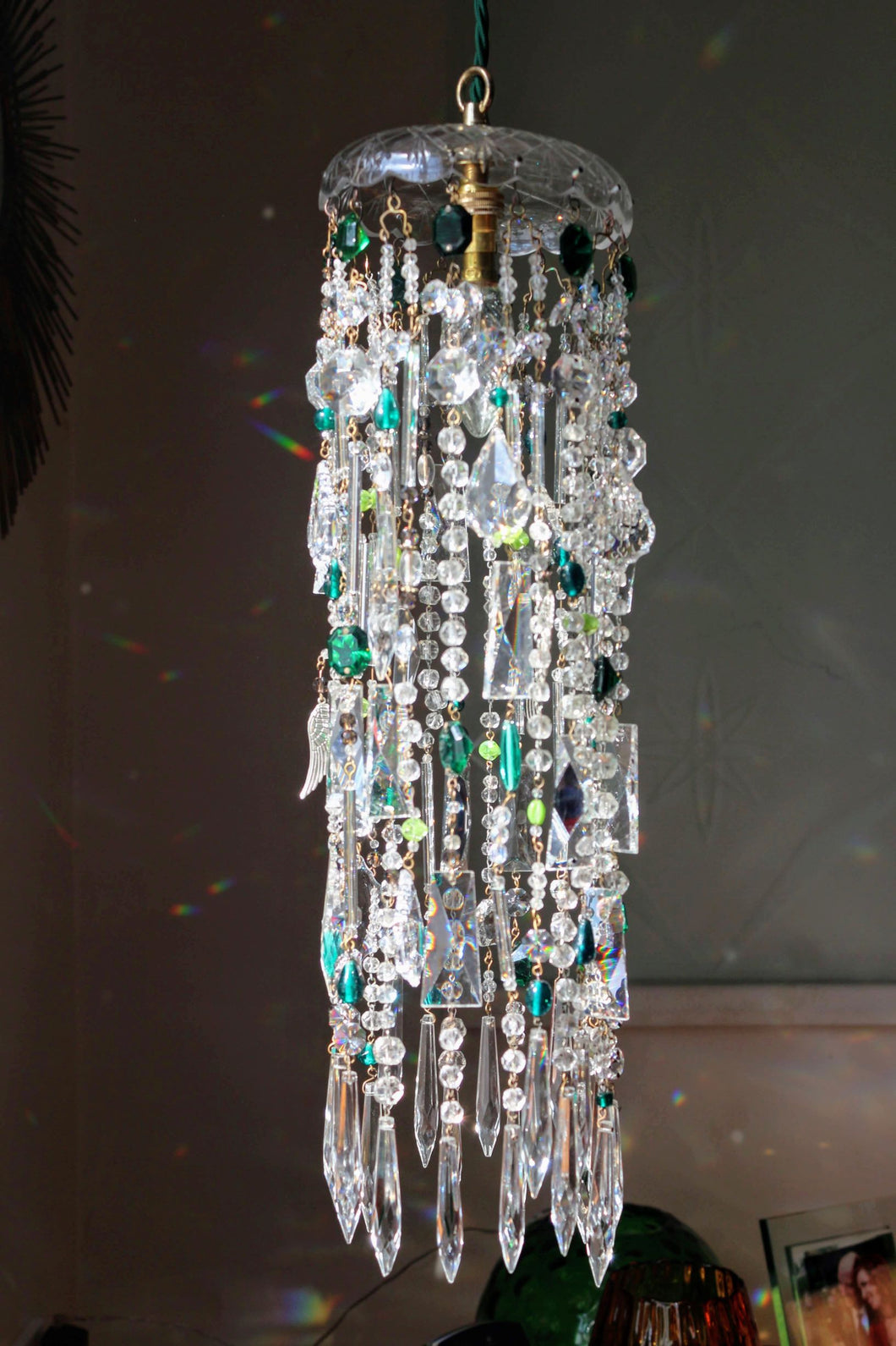 vintage crystal light catcher can be hung as a garden feature or indoor as a light shade .